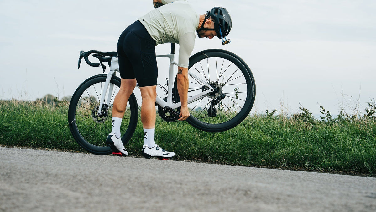 Cyclists riding in Lake cycling shoes